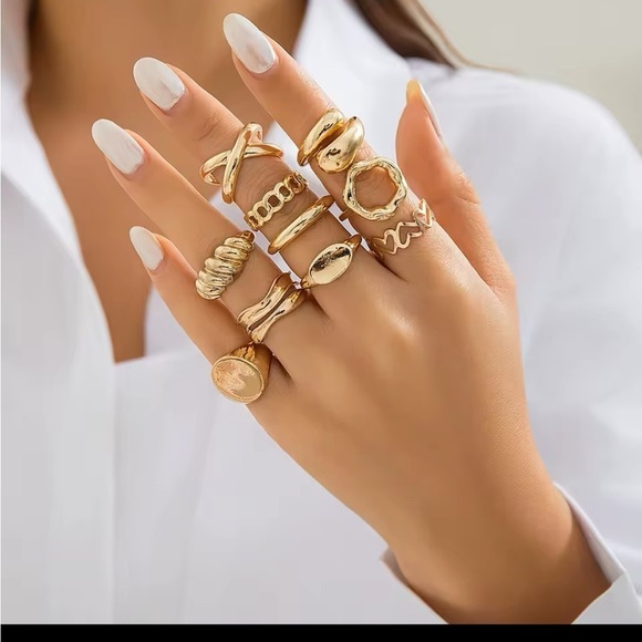 Jewelry - Radiant Gold Ring with Intricate Detailing and Sparkling Gemstones
10 piece set